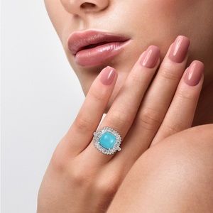 American Natural Sleeping Beauty Turquoise and white Topaz ring .